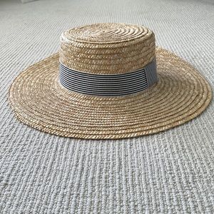 Straw hat with striped ribbon